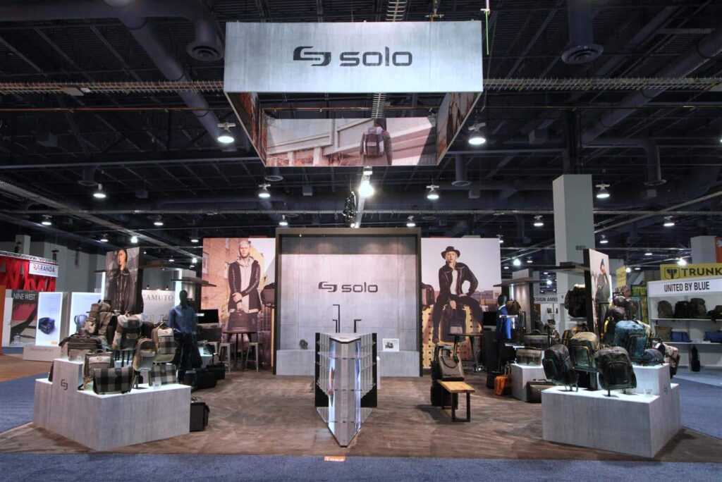 custom trade show exhibit with multi-level podiums